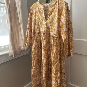 100% cotton midi dress. Never been worn